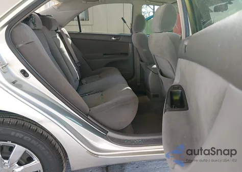 2006 Toyota Camry Le z USA, uszkodzony, nr VIN JTDBE32K963044824